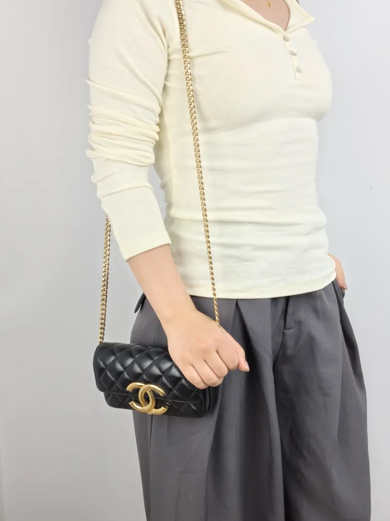Chanel Crossbody Bag C logo Crossbody Bag Black with Gold-Tone Hardware Lambskin One Size 17 × 4 × 10 cm — on-model view 2 of 2