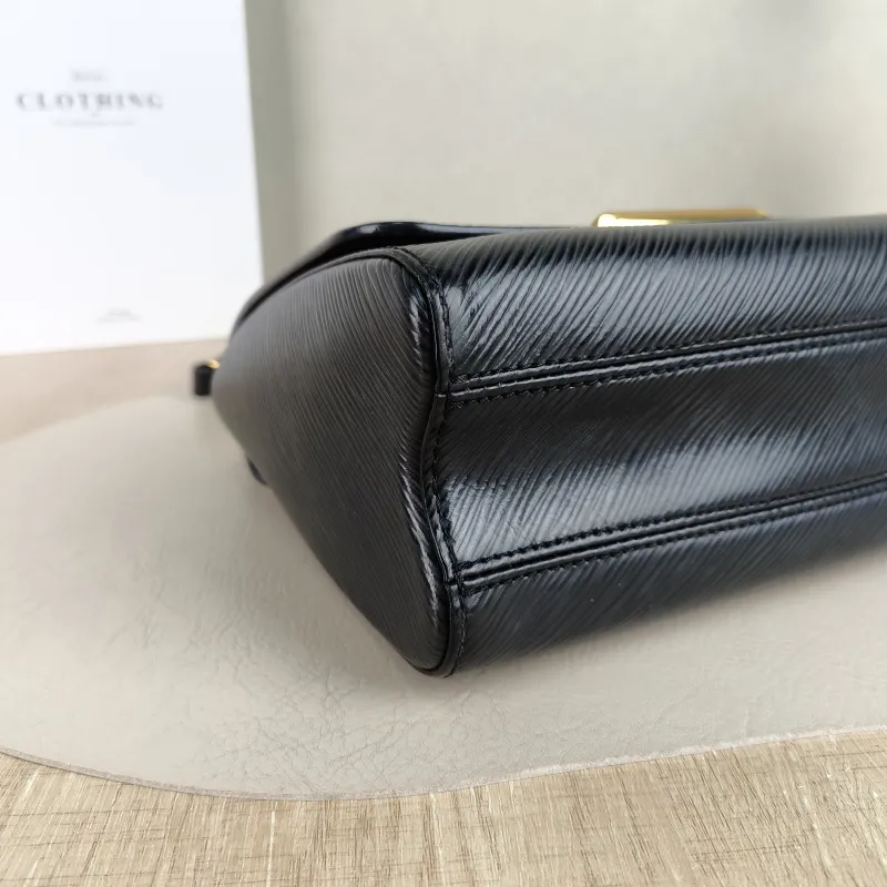 Louis Vuitton Crossbody Bag Twist Black Epi Embossed Calfskin Medium 23 × 9.5 × 17 cm — detail view 10 of 12