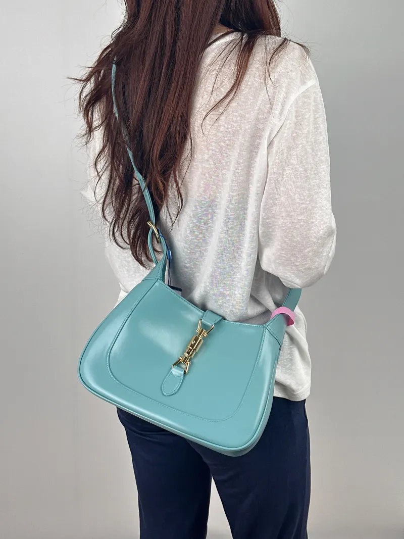 GUCCI Crossbody Bag Jackie 1961Collection Blue Calfskin Medium 27.5 × 4 × 19 cm — on-model view 1 of 2