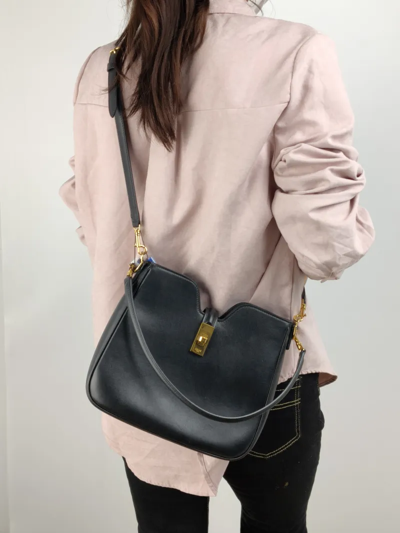 CELINE Shoulder Bag CAMILLE 16 SOFT Shoulder Bag Black Calfskin Small 24.5 × 5 × 21.5 cm — on-model view 1 of 2