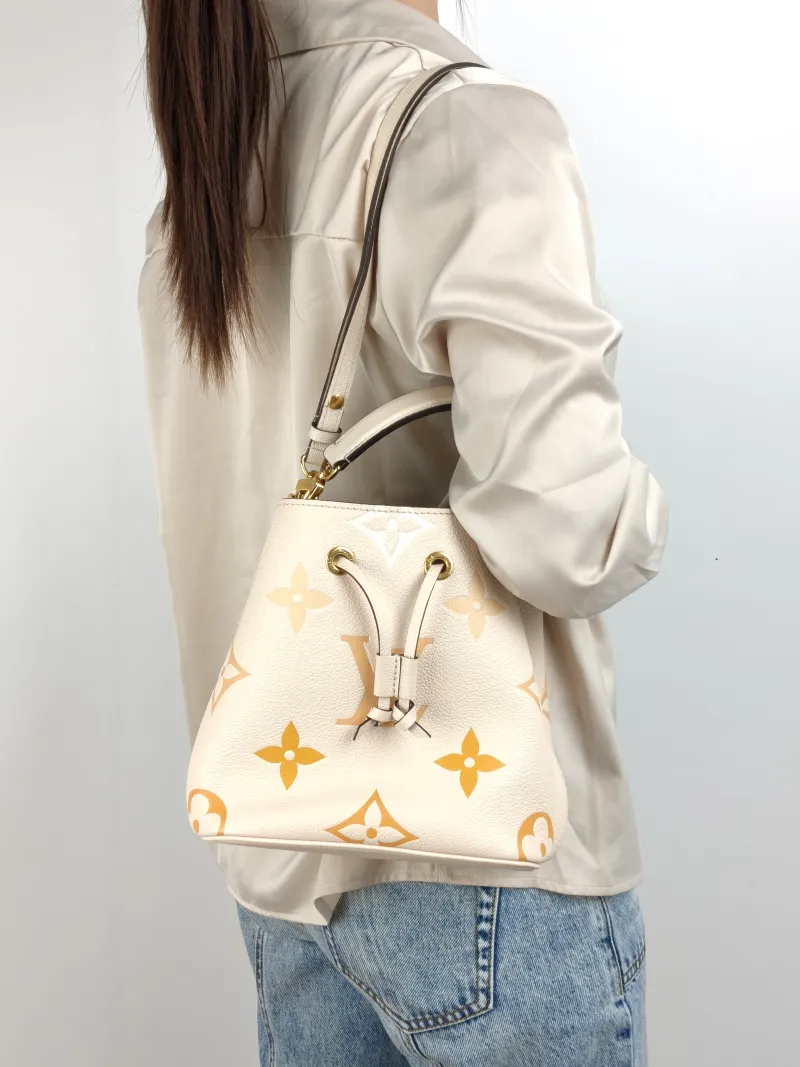 Louis Vuitton Crossbody Bag NÉONOÉ Bucket Bag BB Monogram Empreinte Embossed Calfskin BB 20 × 13 × 20 cm Conditioned — on-model view 2 of 3