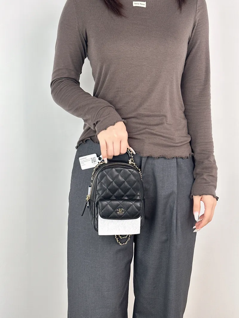 Chanel Backpack mini Backpack Collection Black Grained Calfskin One Size13 × 9 × 18 cm — on-model view 1 of 3