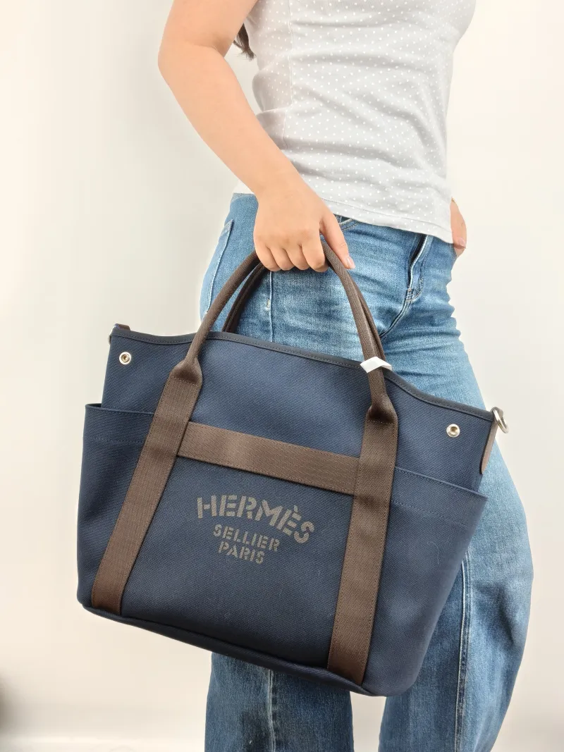 Hermès Top Handle Bag Top Handle Bag Canvas One Size 39 × 15 × 35 cm B — on-model view 2 of 2