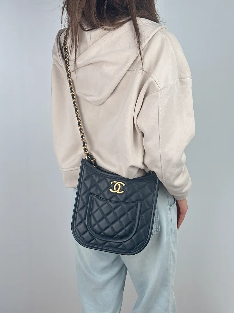 Chanel Crossbody Bag hobo Black Calfskin One Size 22 × 6 × 24 cm — on-model view 1 of 2