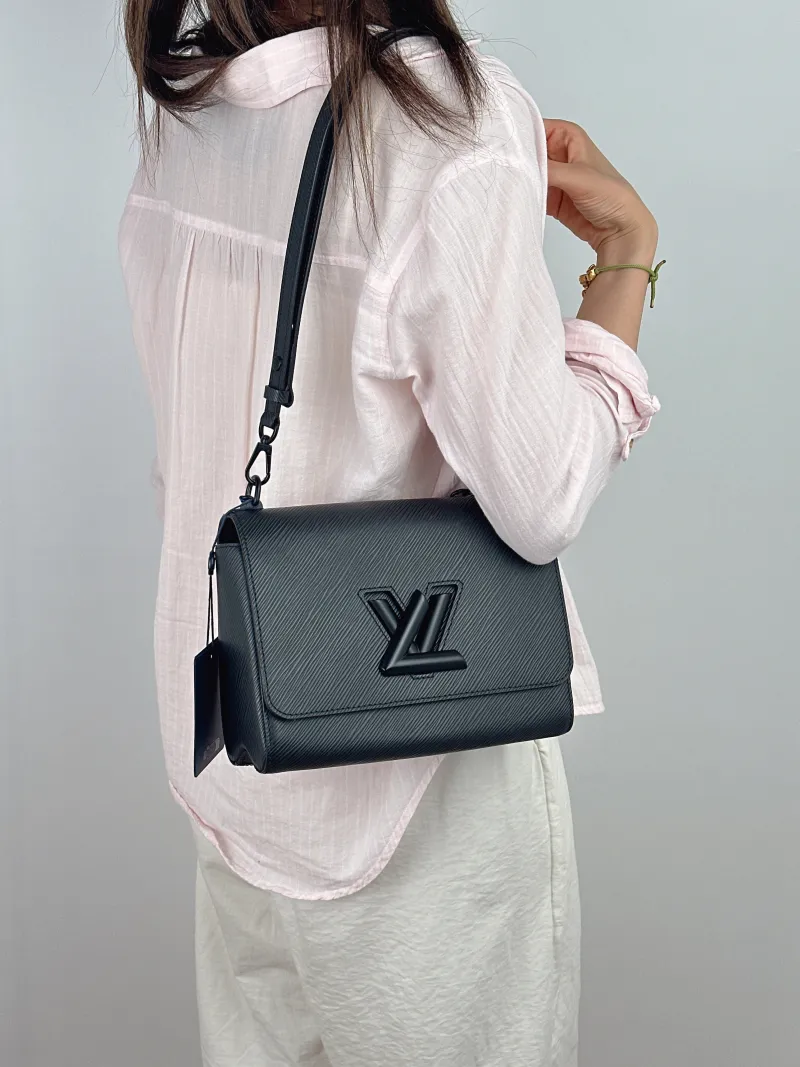 Louis Vuitton Crossbody Bag Twist Black Epi Embossed Calfskin Medium23 × 9.5 × 17 cm — on-model view 2 of 3