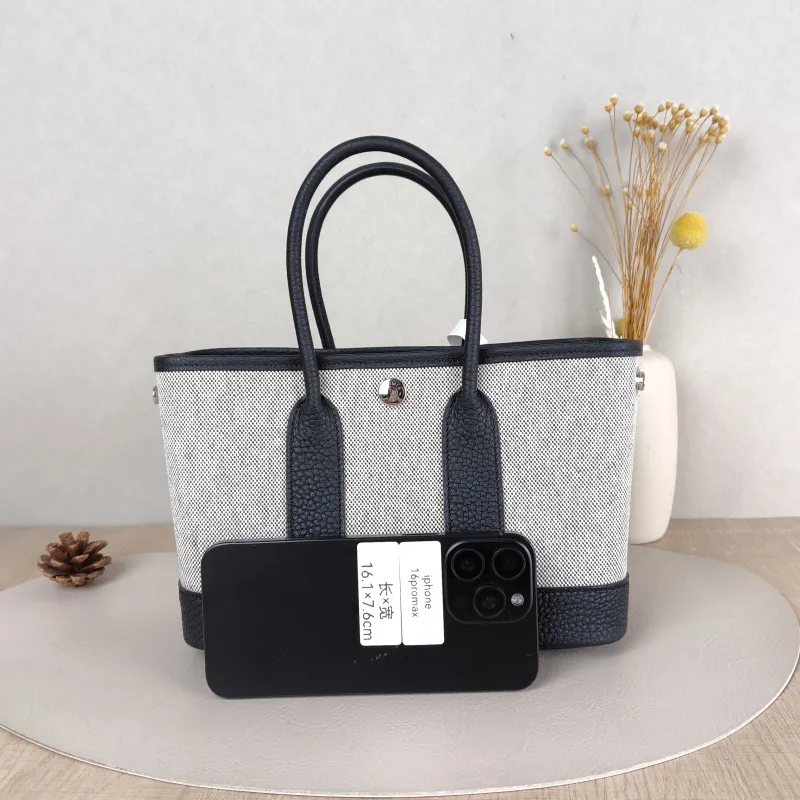 Hermès Top Handle Bag Neo Garden 23 Mini Black · Beige Canvas · Negonda Calfskinmini23 × 10 × 16 cm — cover view 2 of 6