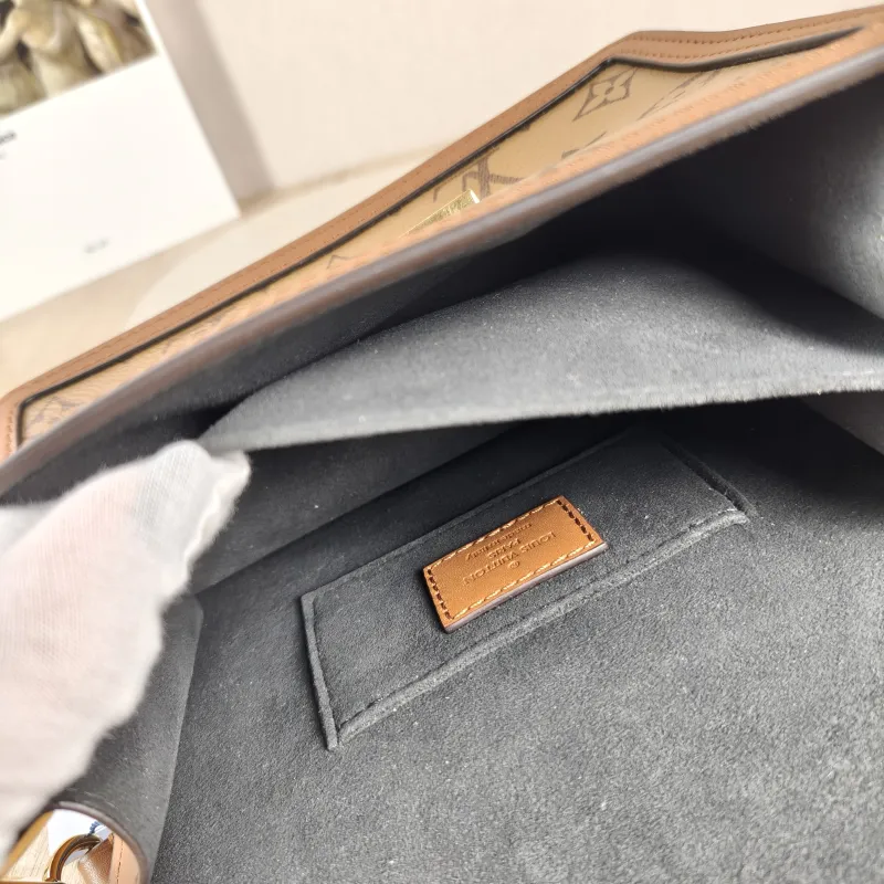 Louis Vuitton Crossbody Bag Dauphine Monogram PV Cmini20 × 9 × 15 cm — detail view 13 of 13