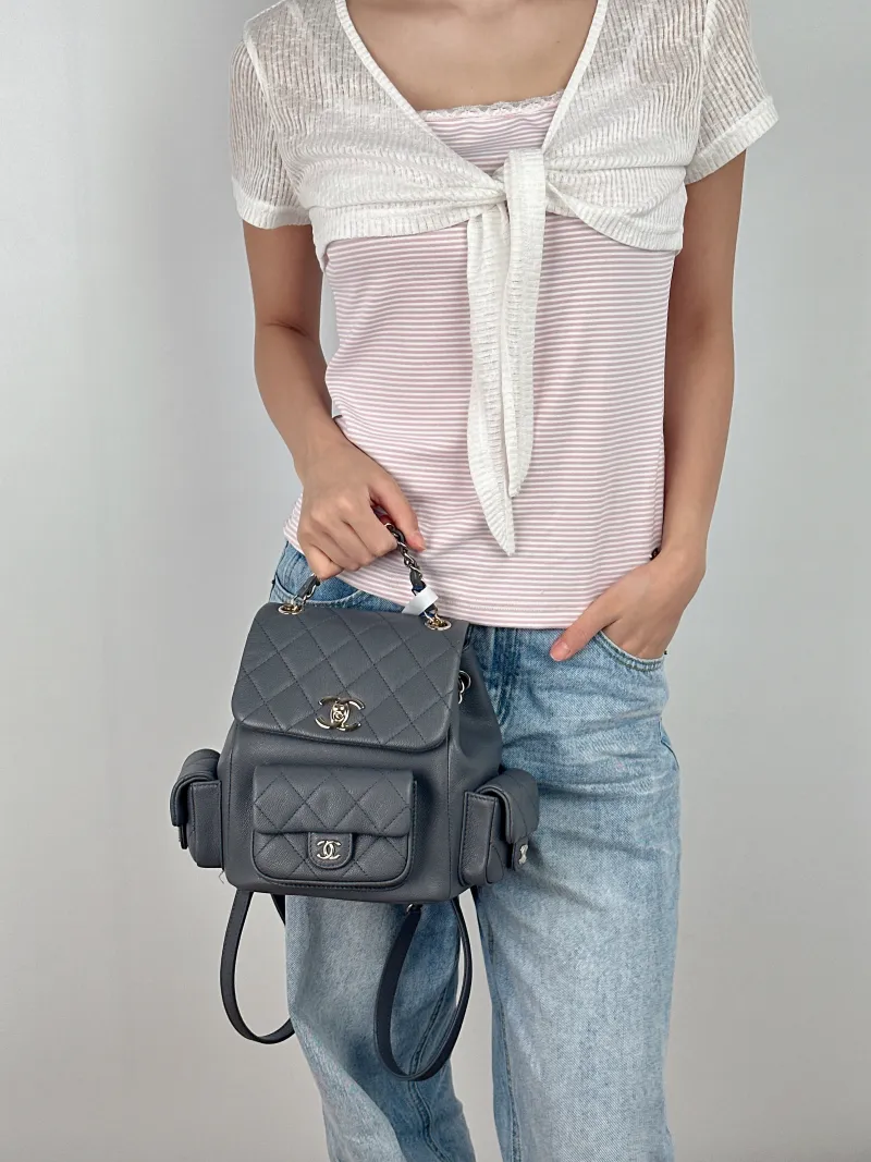 Chanel Backpackduma Grey Grained Calfskin Large21 × 13 × 23 cm — on-model view 3 of 3