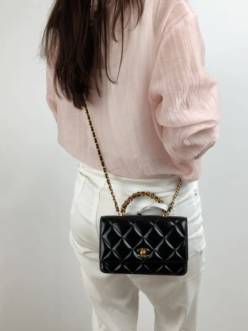 Chanel Crossbody Bag woc Black Waxed Leather One Size 19.2 × 3.5 × 12.3 cm — on-model view 1 of 2