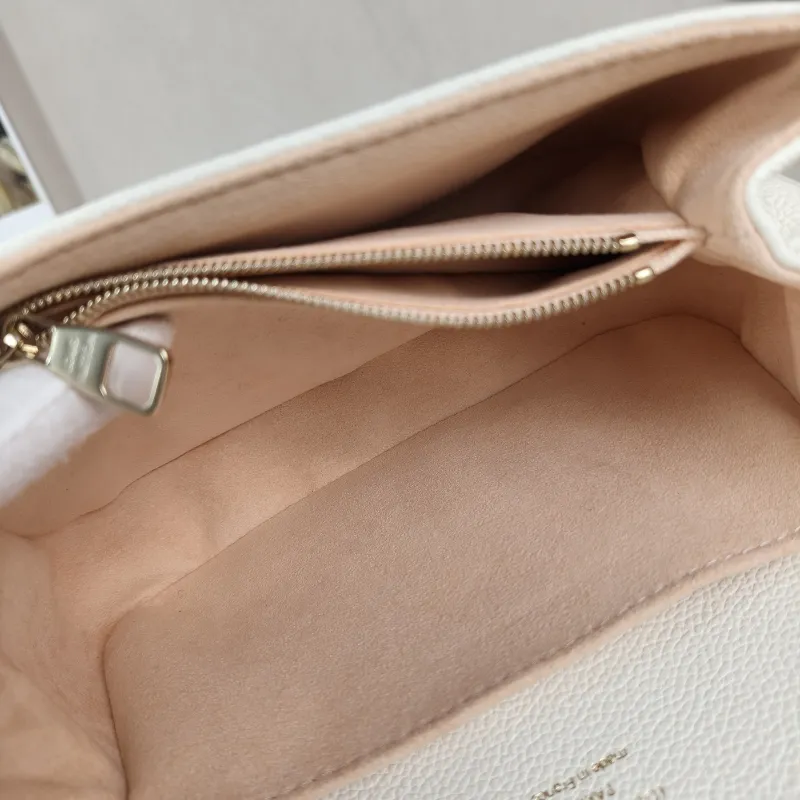 Louis Vuitton Crossbody Bag Pochette Métis East West White · Pink Monogram Empreinte Embossed Calfskin Small21.5 × 6 × 13.5 cm — detail view 6 of 13