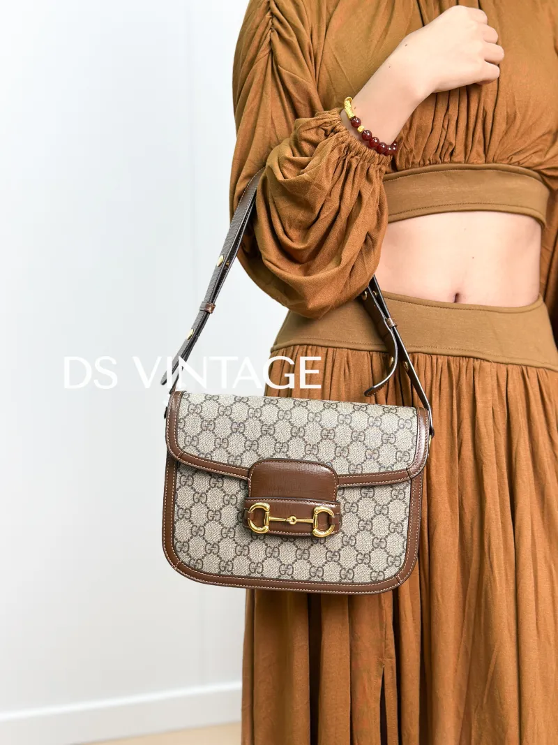 GUCCI Shoulder Bag Horsebit 1955 Horsebit Medium Monogram PVC Medium 25 × 8 × 18 cm — on-model view 2 of 3