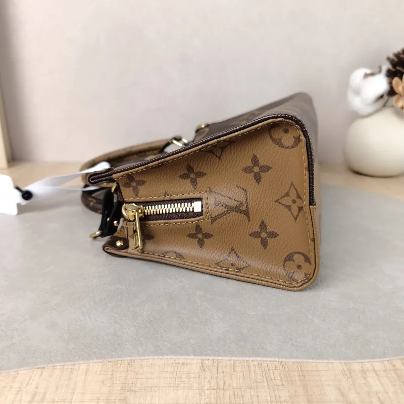 Louis Vuitton Crossbody Bag Onthego East West Monogram PVC Small 25 × 10 × 13 cm — detail view 9 of 16