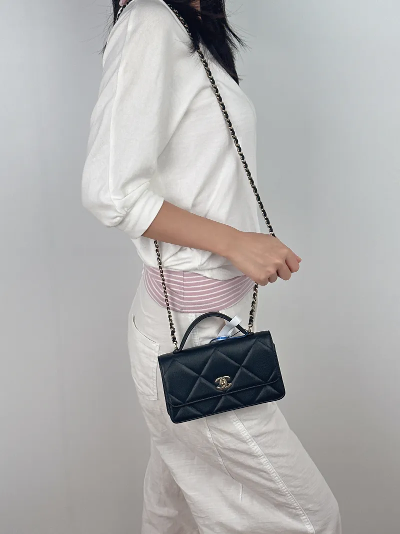 Chanel Crossbody Bag woc Black Grained Calfskin One Size 19.2 × 3.5 × 12.3 cm — on-model view 2 of 3