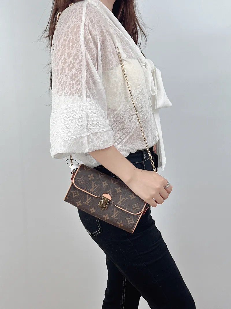 Louis Vuitton Crossbody Bag POCHETTE CAMILLE Monogram PVC One Size20.5 × 6 × 11 cm — on-model view 1 of 2