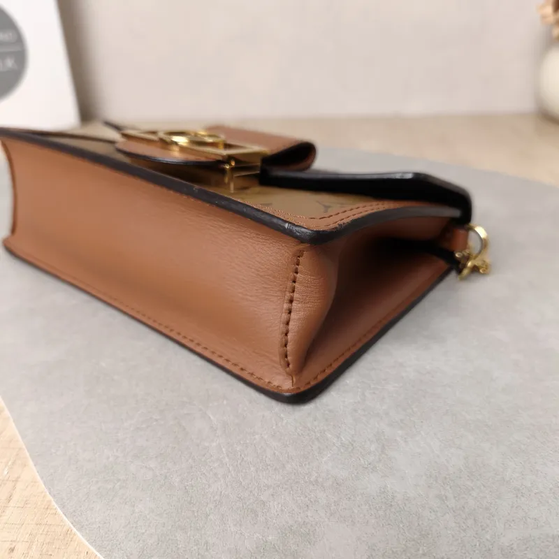 Louis Vuitton Crossbody Bag Dauphine Woc Woc Monogram PVC Mini 18.5 × 5 × 12 cm — detail view 9 of 11