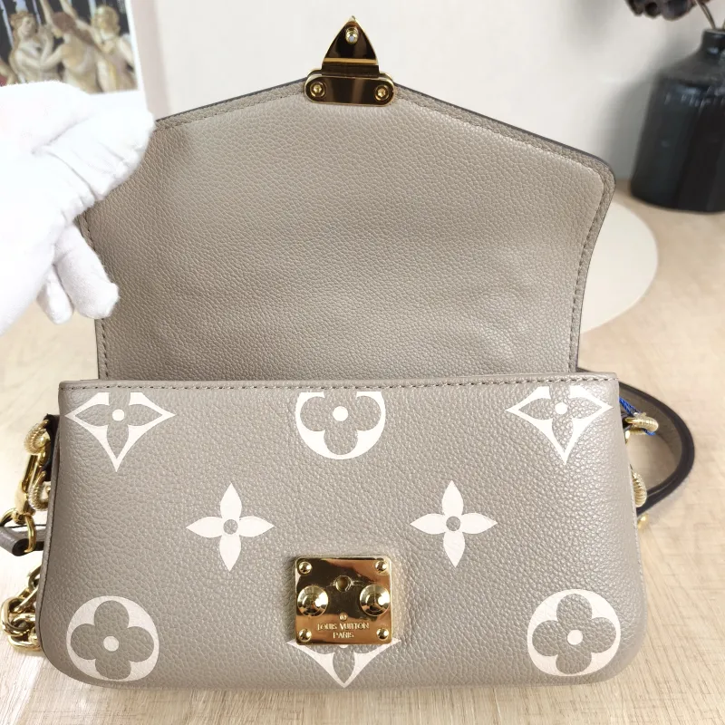 Louis Vuitton Crossbody Bag Pochette Métis East West Monogram Empreinte Embossed Calfskin Small 21.5 × 6 × 13.5 cm — detail view 6 of 12