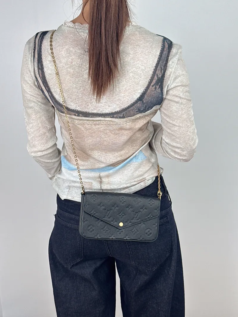 Louis Vuitton Crossbody Bag Pochette Félicie Black Calfskin Small21 × 3 × 12 cm — on-model view 2 of 2