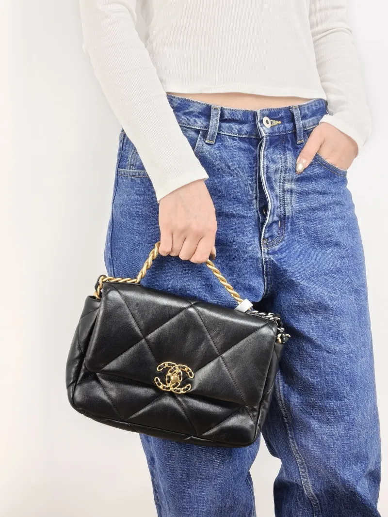 Chanel Crossbody Bag 19Bag Black SL ambskin Small 26 × 9 × 16 cm — on-model view 1 of 3